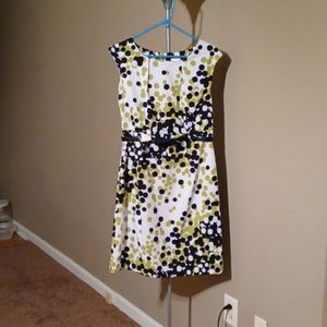 White, olive green, black dress with black belt